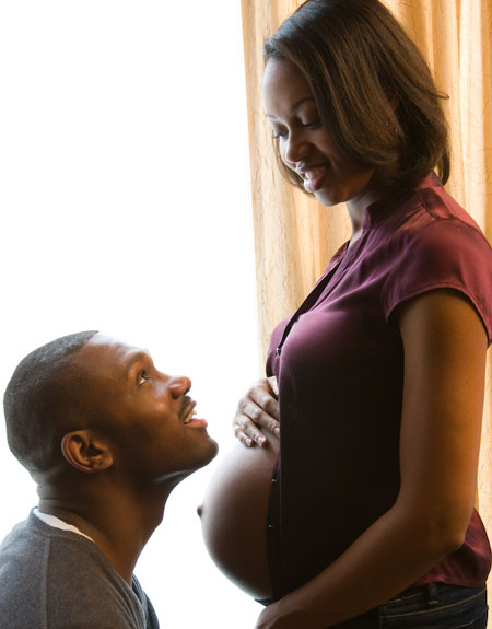 Couple pregnancy belly 8 months 1